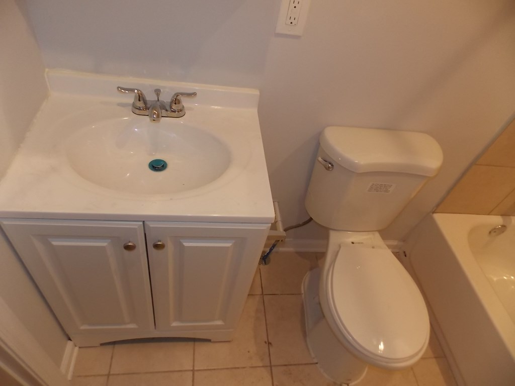 a bathroom with a sink and a toilet