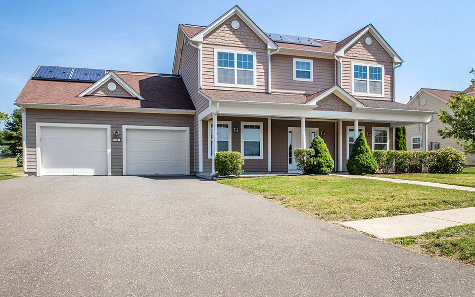 a house with a garage and a driveway