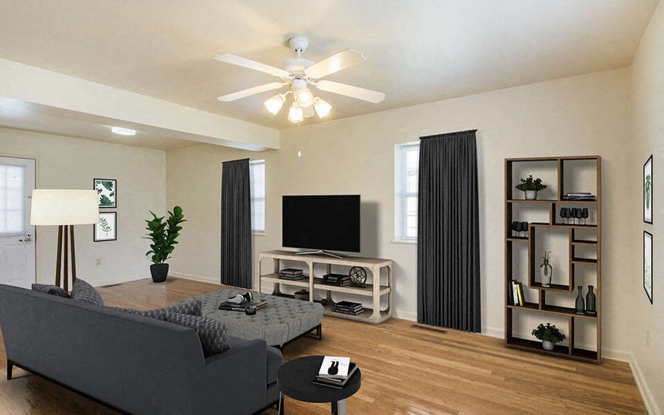 a living room with a couch and a tv