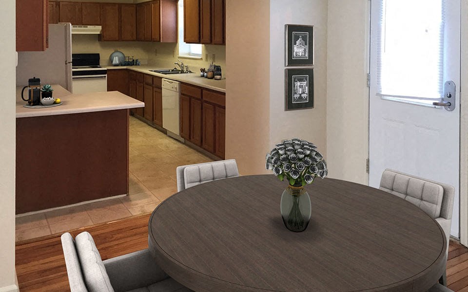 a kitchen and dining room with a table and chairs