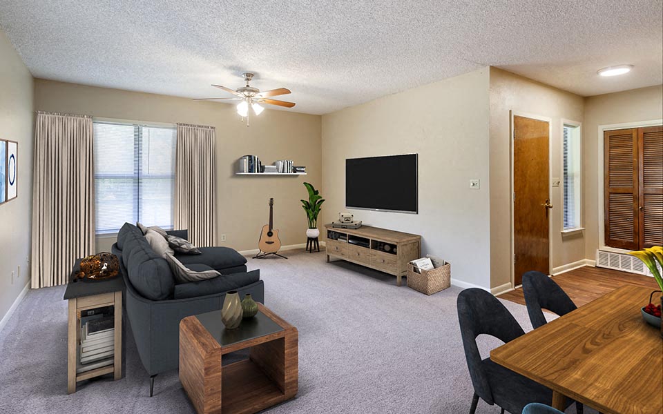 a living room with a couch and a table