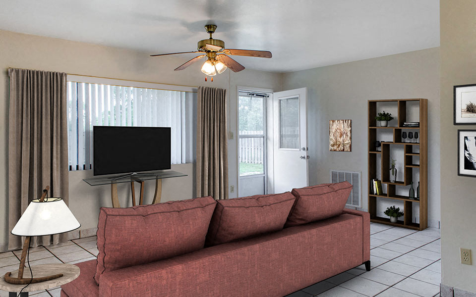 a living room with a couch and a tv