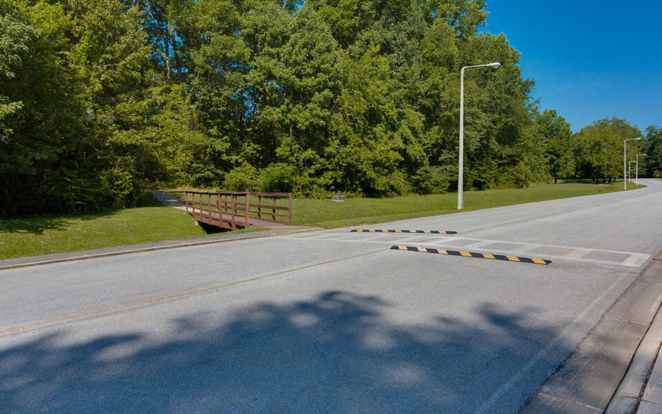 a bridge on the side of a road