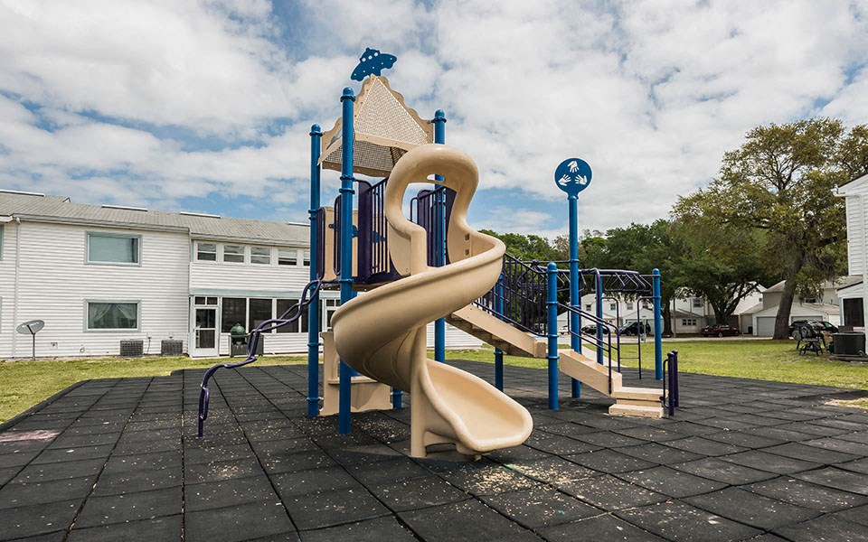 a slide on a playground at a school