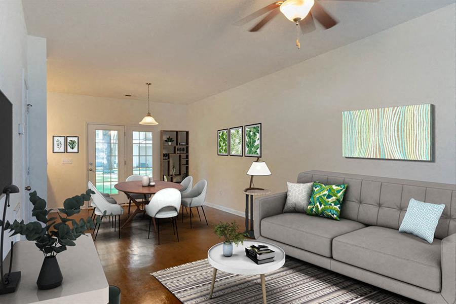 a living room with a couch and a table