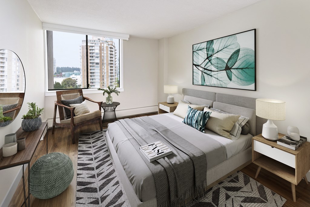 a bedroom with a bed and a large window