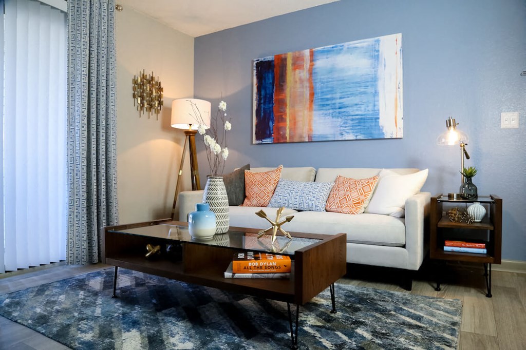 a living room with a couch and a coffee table