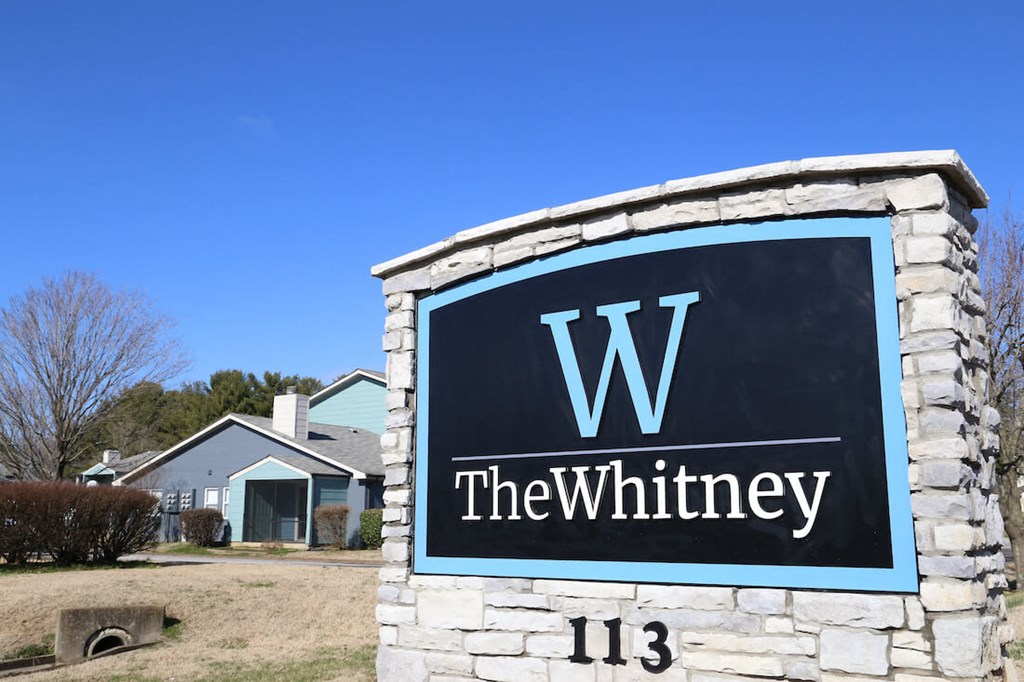 a building with a sign for the winery