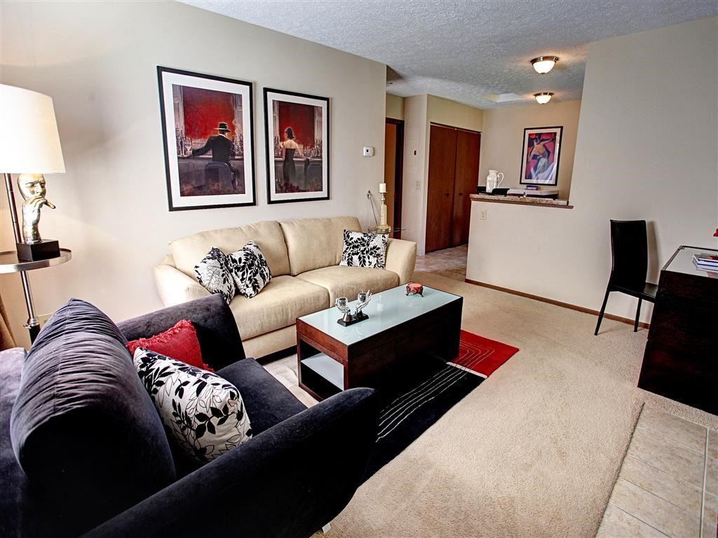 a living room with a couch and a table