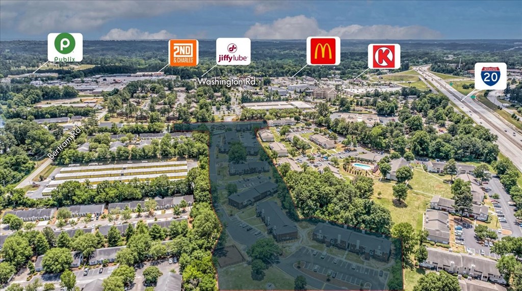 an aerial view of a city with icons of different buildings and trees