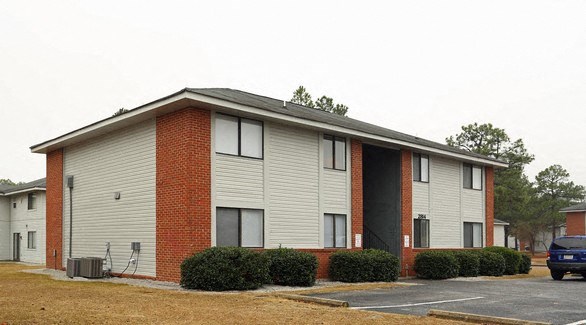 a building with a car parked in front of it