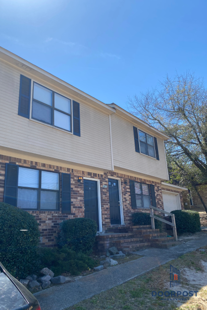 a house with a blue sky in the background