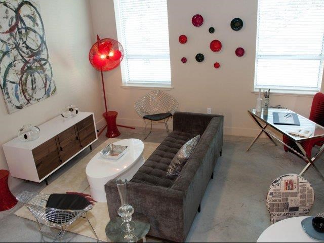 a living room with a couch and a table