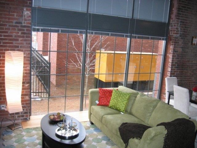 a living room with a couch and a table