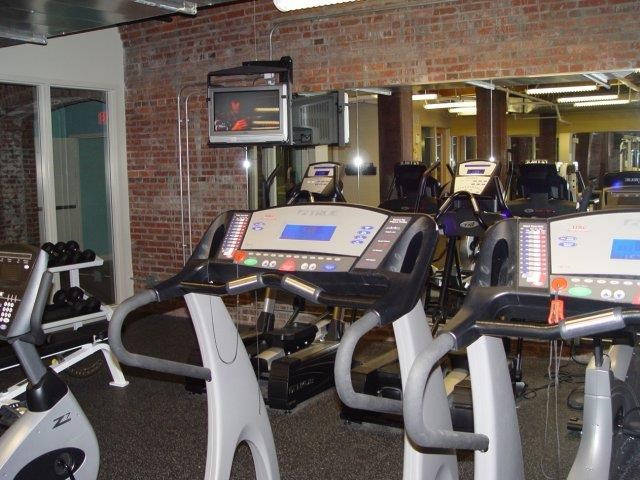 a gym with a bunch of exercise machines