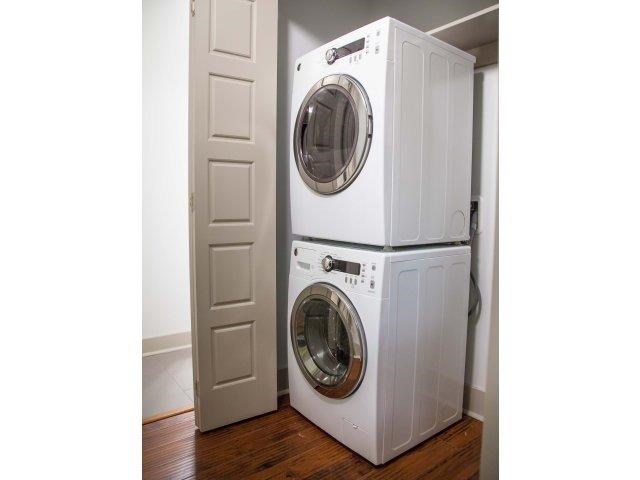 a white washing machine and a white door