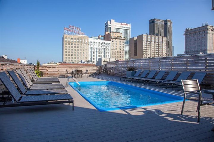a swimming pool on the top of a roof