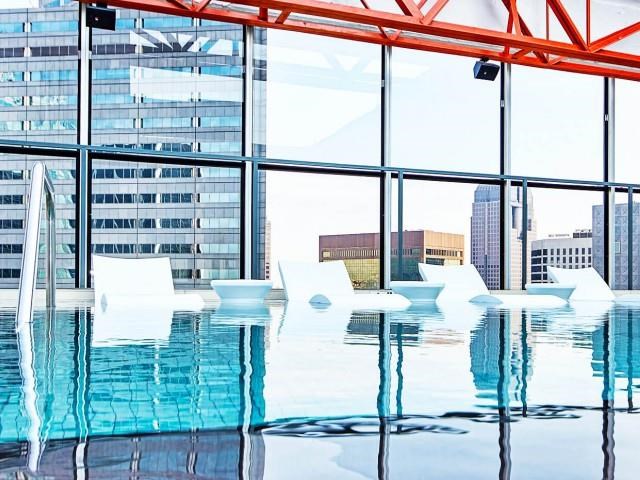a large pool of water in front of a window