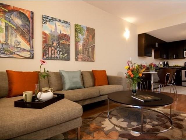 a living room with a couch and a table