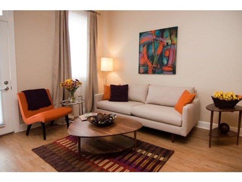 a living room with a couch and a table