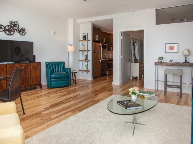 a living room with a couch and a table