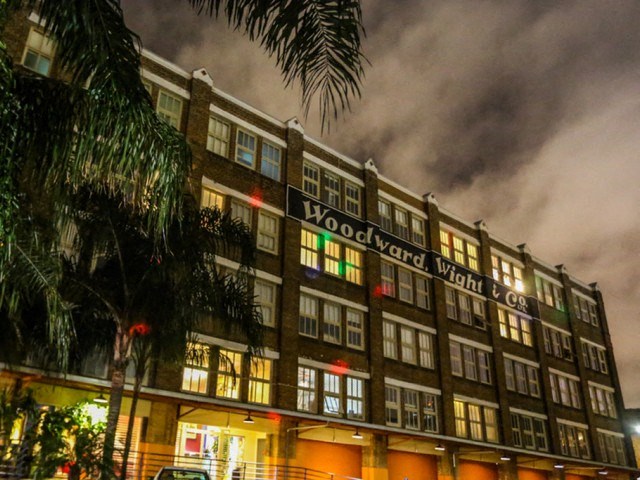a large building with a sign on the side of it
