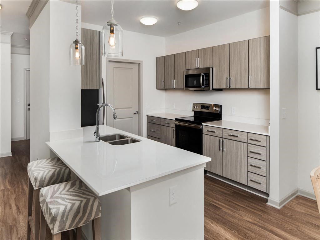 a kitchen with a counter top and a sink