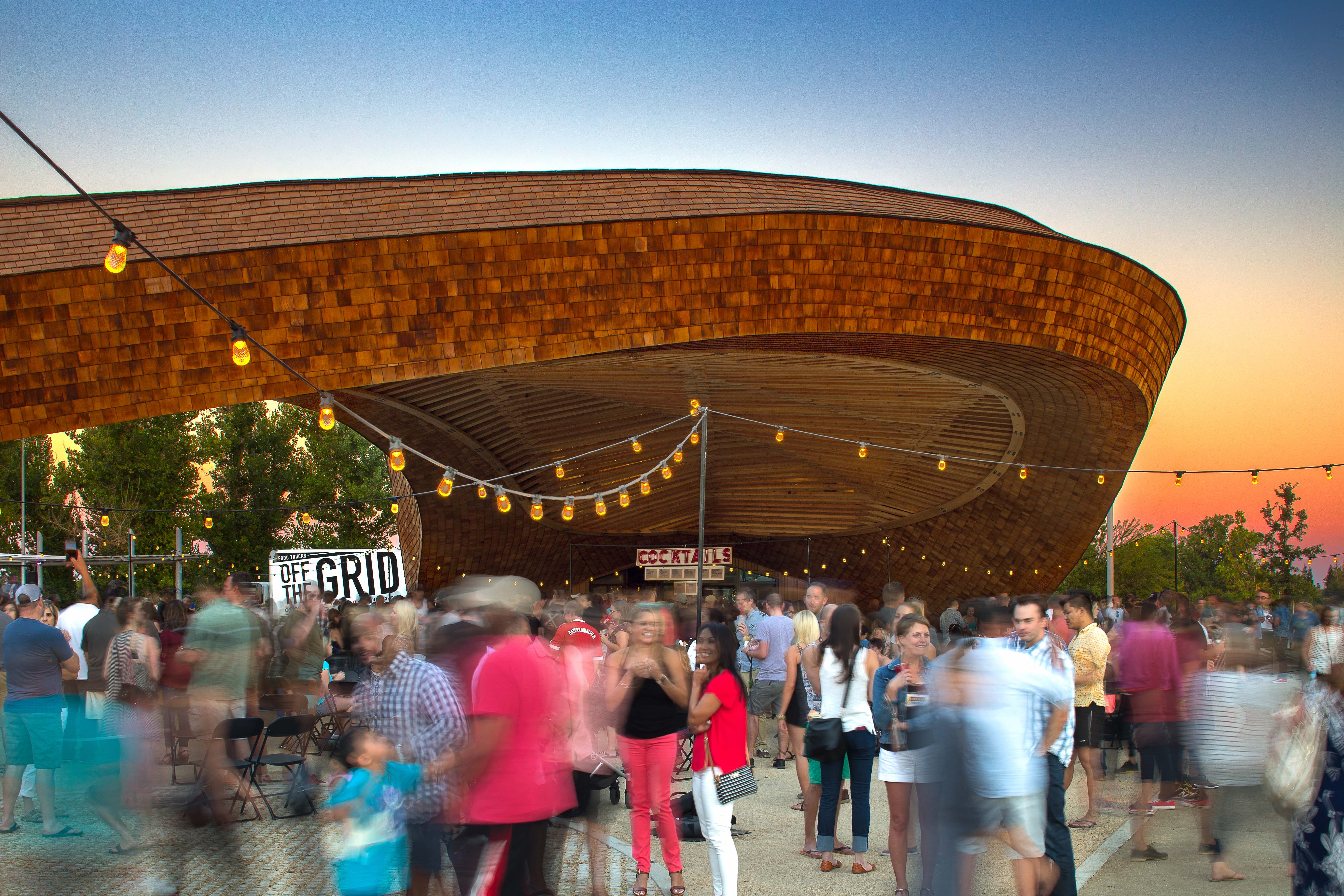 a crowd of people in front of a building