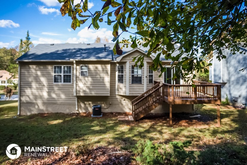 a house with a porch and a deck