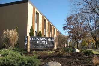 a building with a sign that says fountain flats