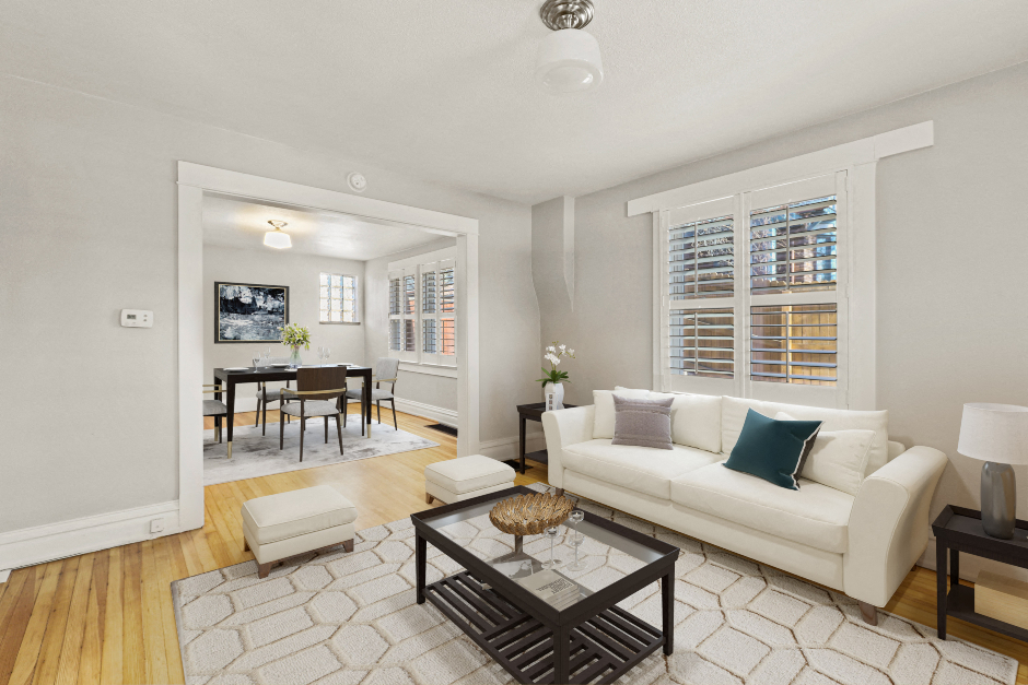 a living room with a couch and a table