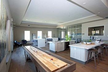 clubhouse with shuffle board Vasari Apartments | Elk Grove |