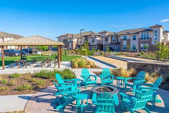 seating by fire pit and playground