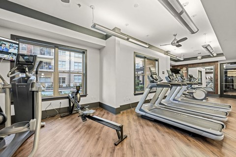 the gym is equipped with treadmills and other exercise equipment