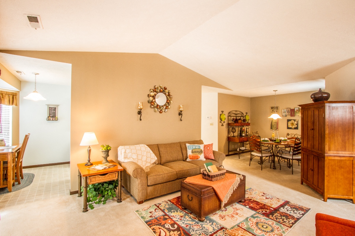 a living room with a couch and a table