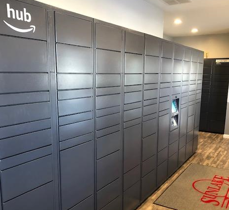 a large set of blue lockers in a room