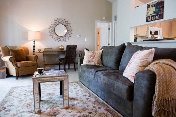 a living room with a couch and a coffee table