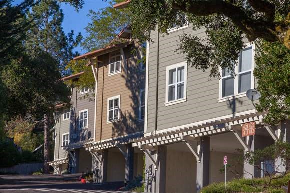 Exterior building view showing carports