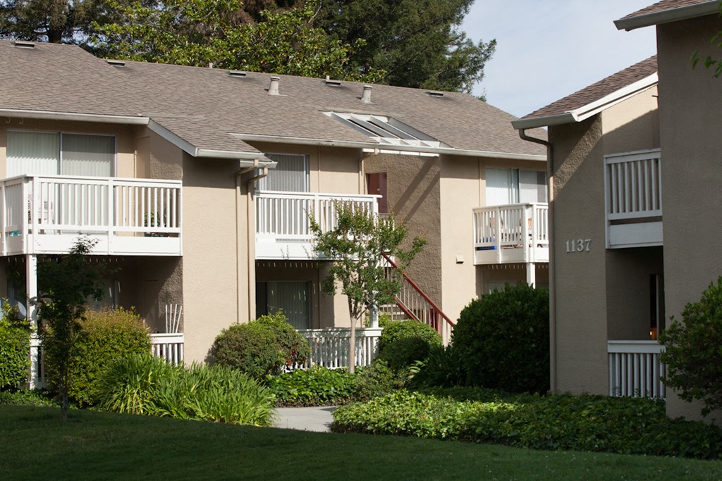 an exterior view of a building at the whispering winds apartments in pearland