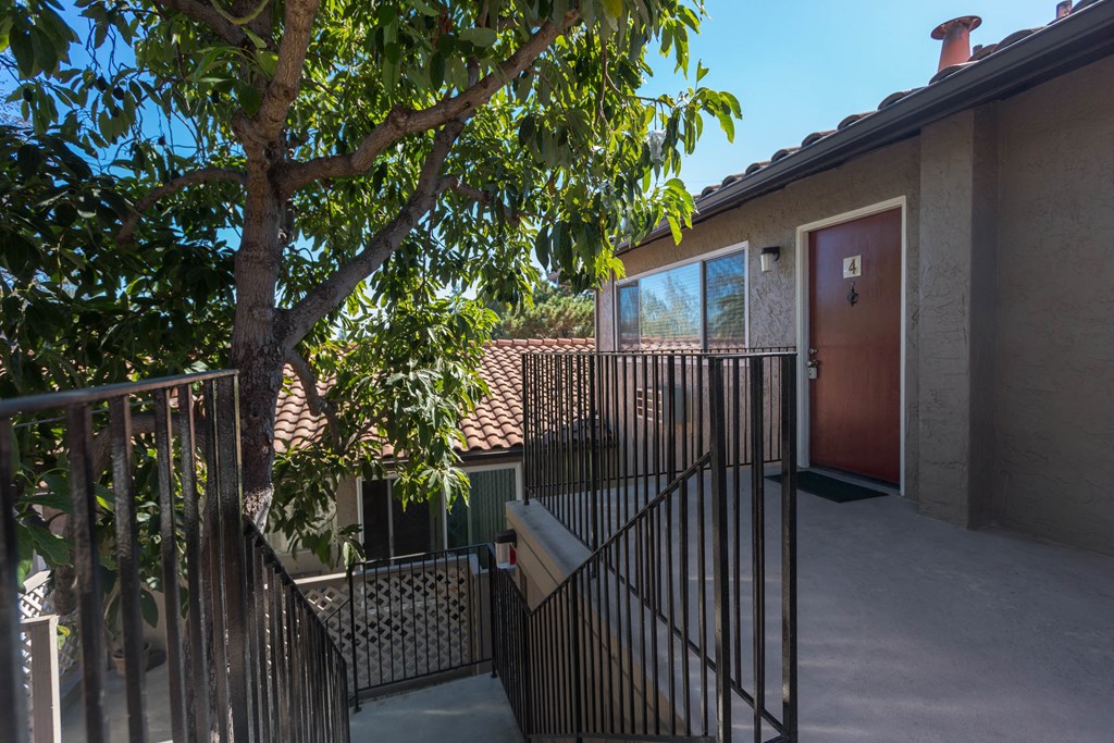 a building with a tree in front of it
