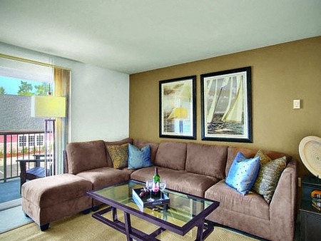 a living room with a couch and a table