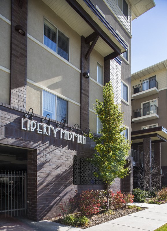 a building with a sign that reads liberty motel