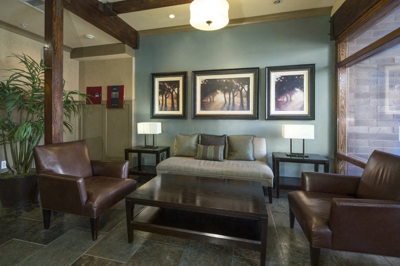 a living room with a couch and a table