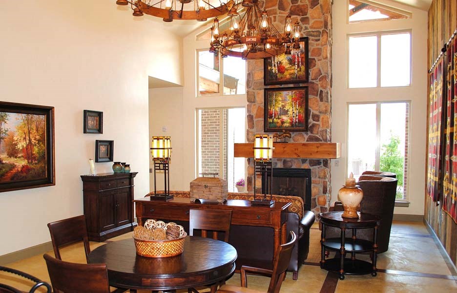 a dining room with a table and chairs and a fireplace