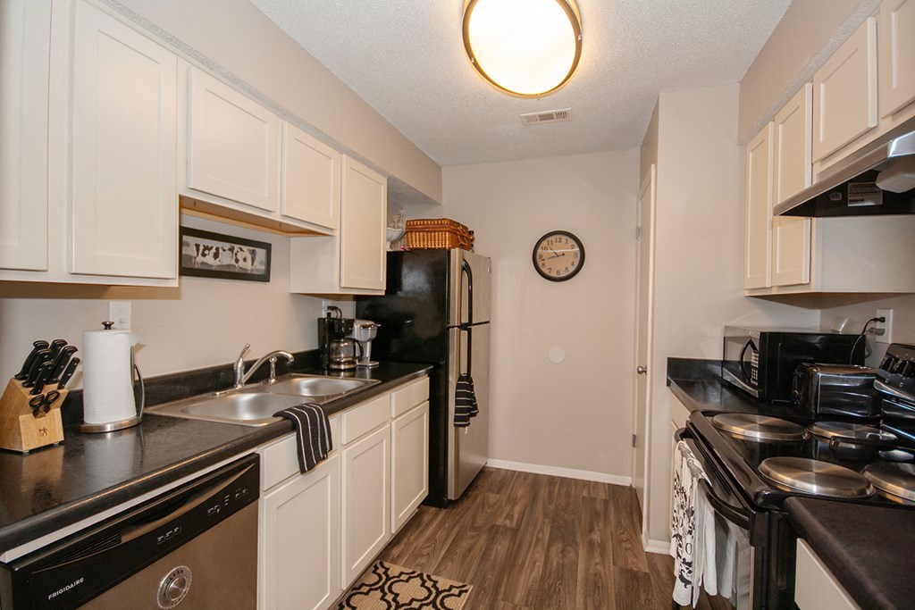the preserve at ballantyne commons apartment kitchen with black appliances