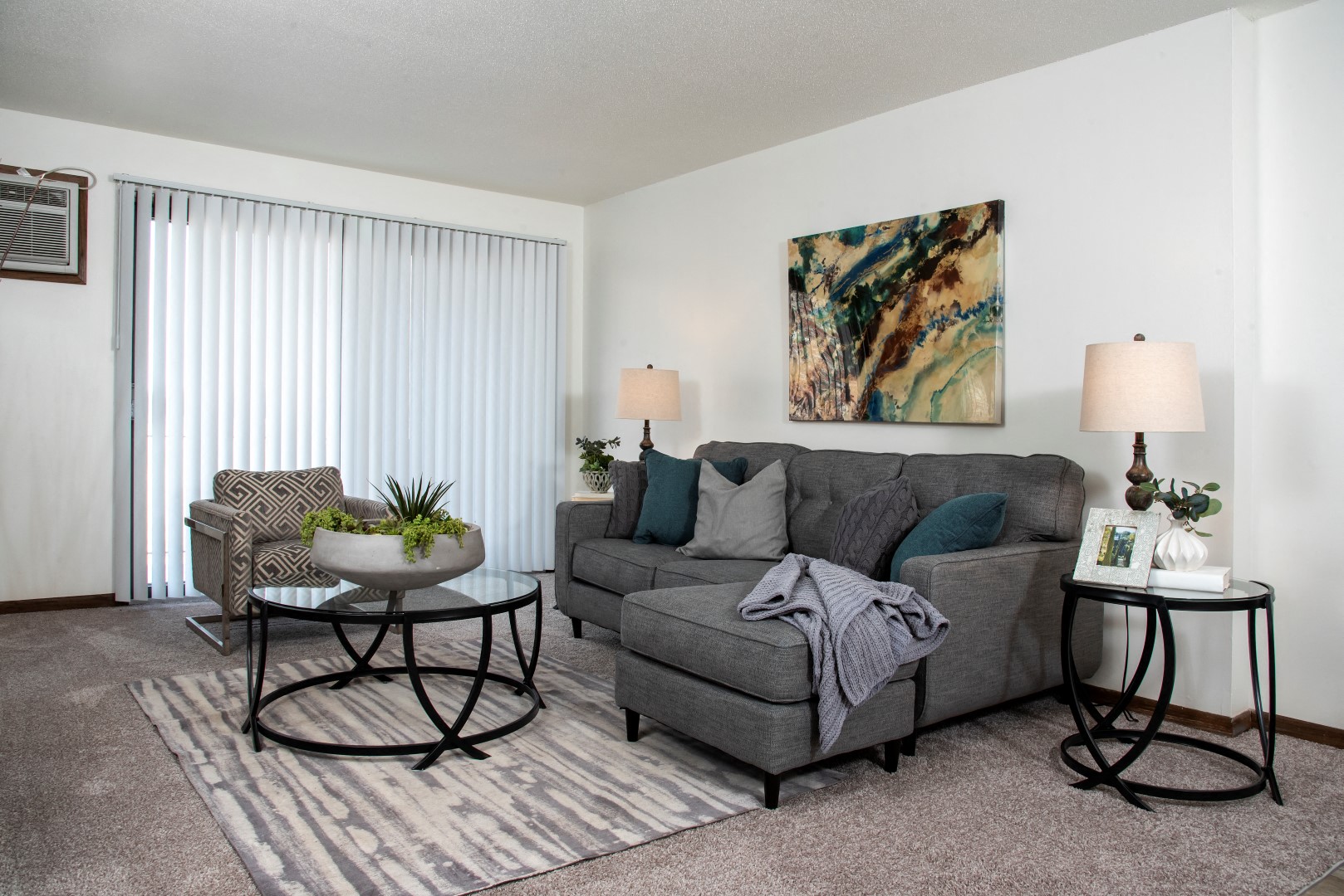 a living room with a couch and a table