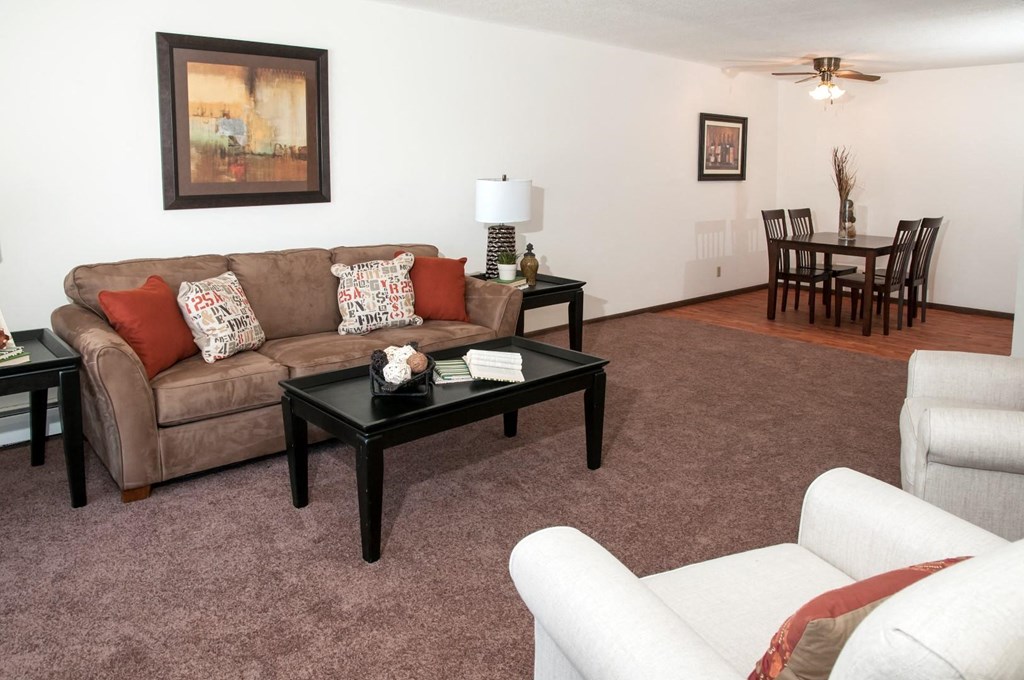 a living room with a couch and a table