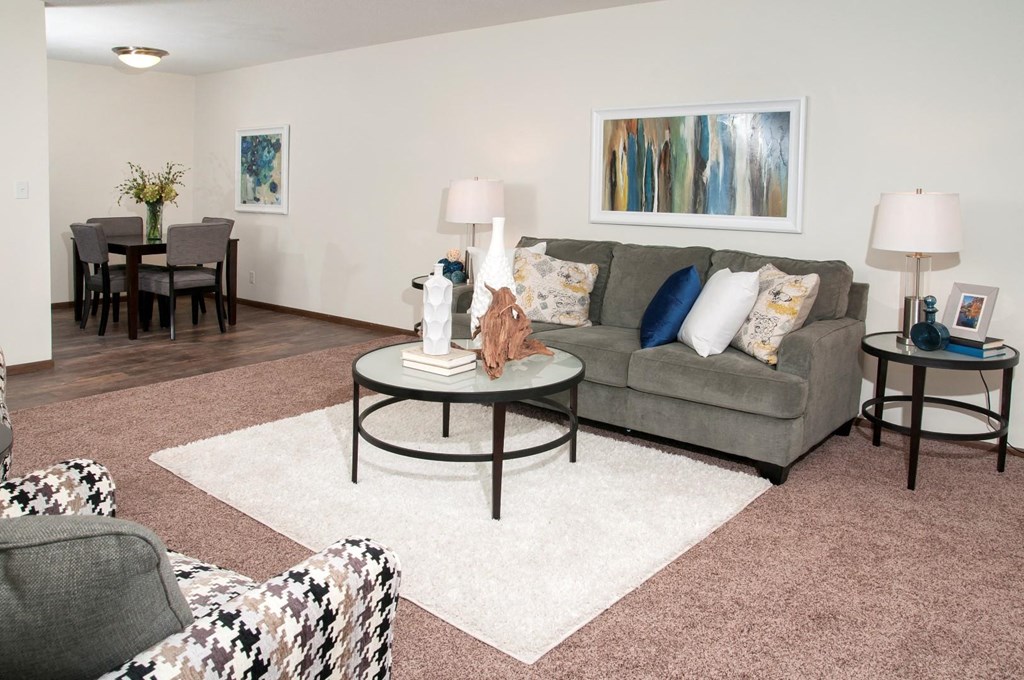 a living room with a couch and a table