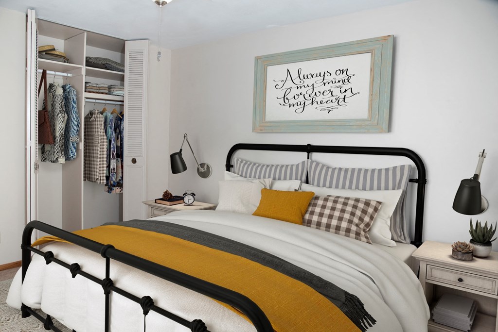 a bedroom with a bed and a closet