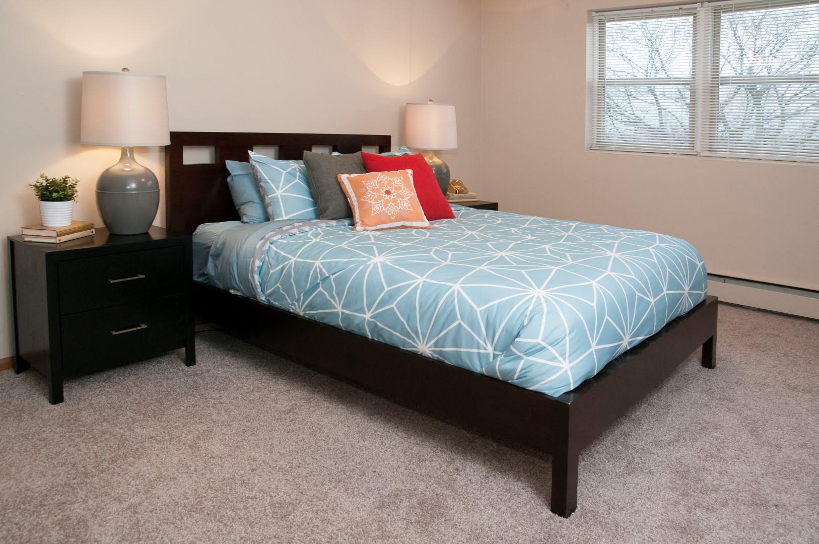 Boulevard 100 Apartments Large Carpeted Master Bedroom